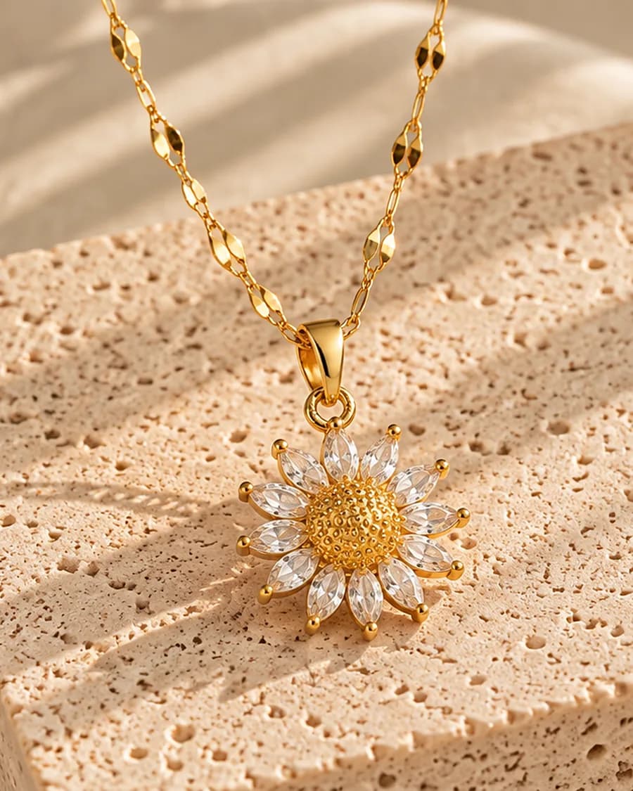 Daisy Necklace photographed on a travertine block in warm daylight