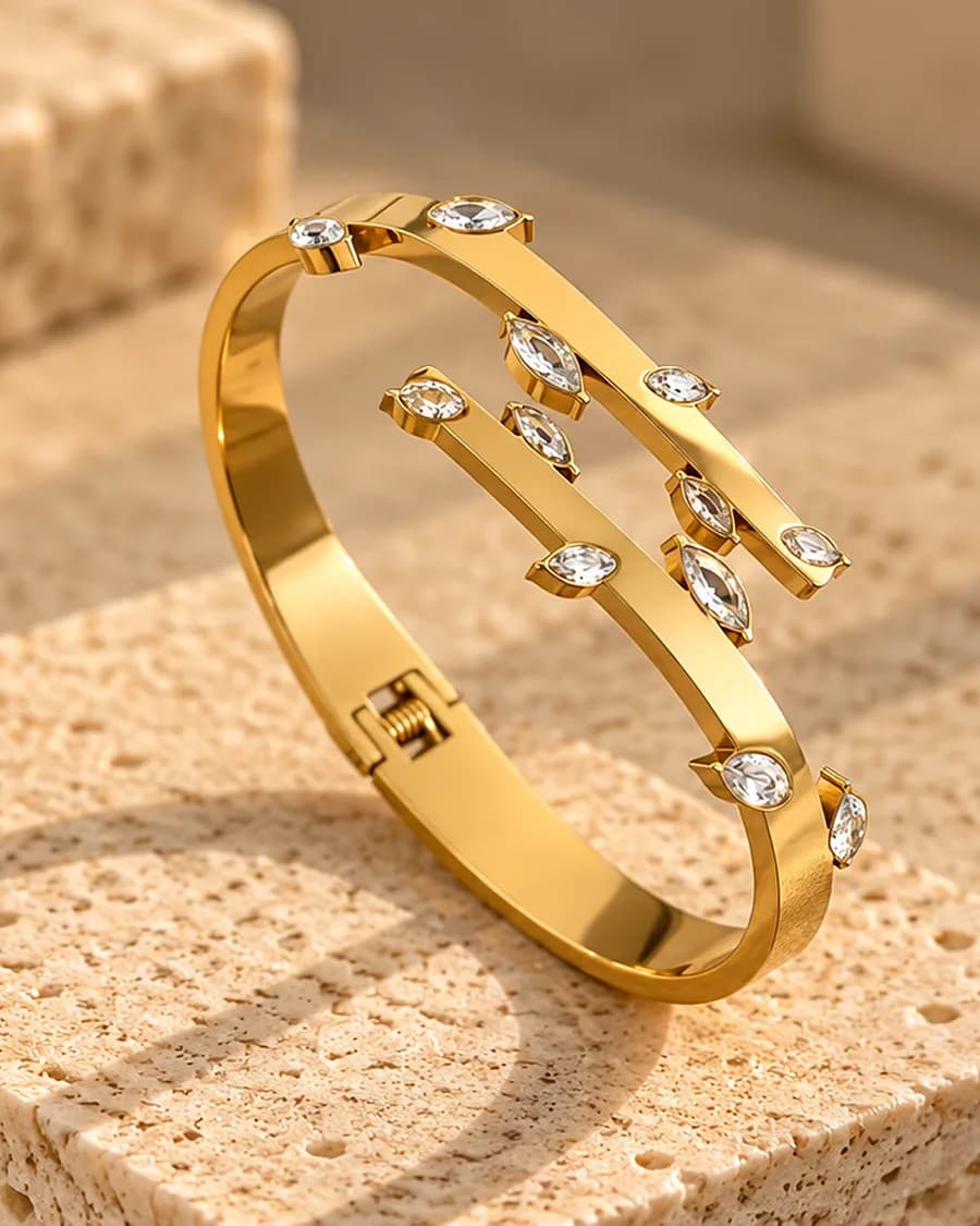 The Starlit Bracelet photographed on a travertine block in warm daylight