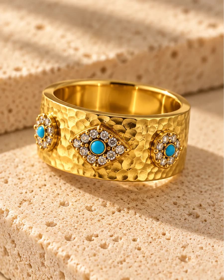 The Nazar Ring photographed on a travertine block in warm daylight