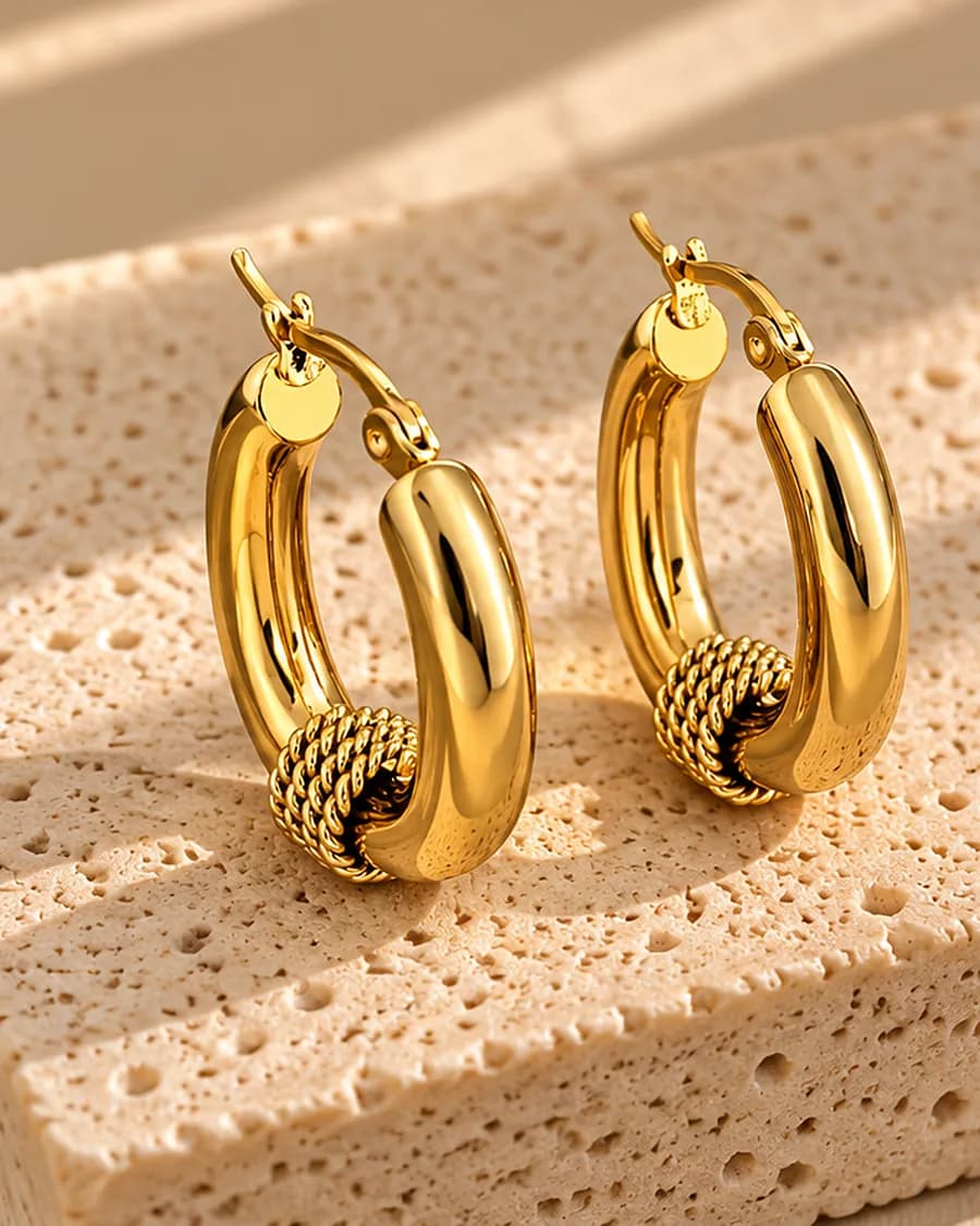 The Noeud Hoops photographed on a travertine block in warm daylight